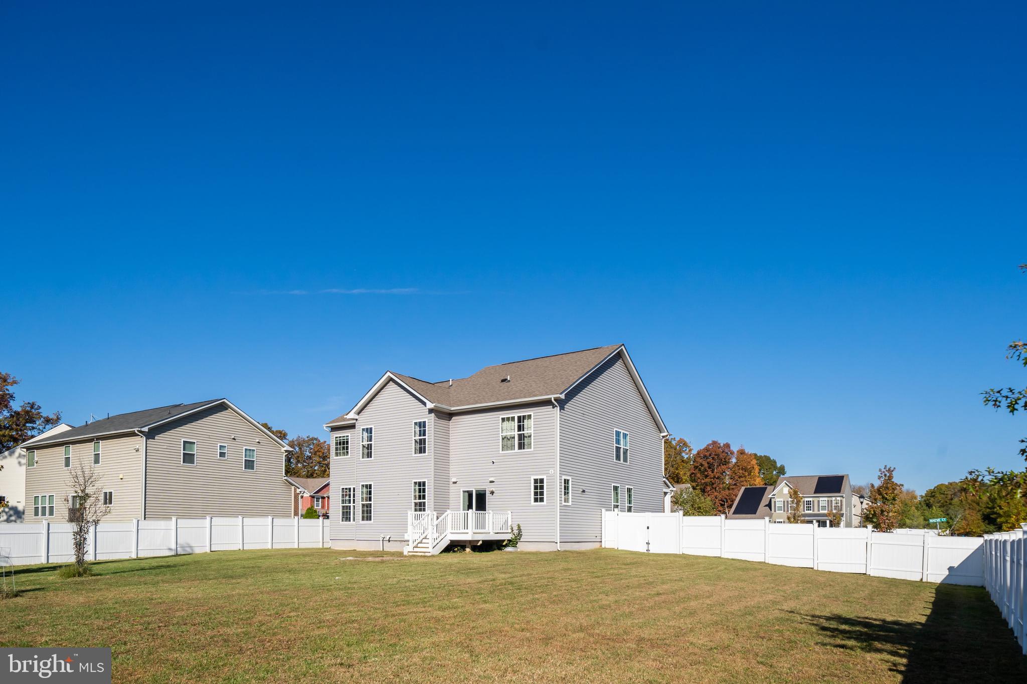800 Naeve Court Accokeek, MD 20607 - Photo 54 of 56 a large house with a large pool in front of it