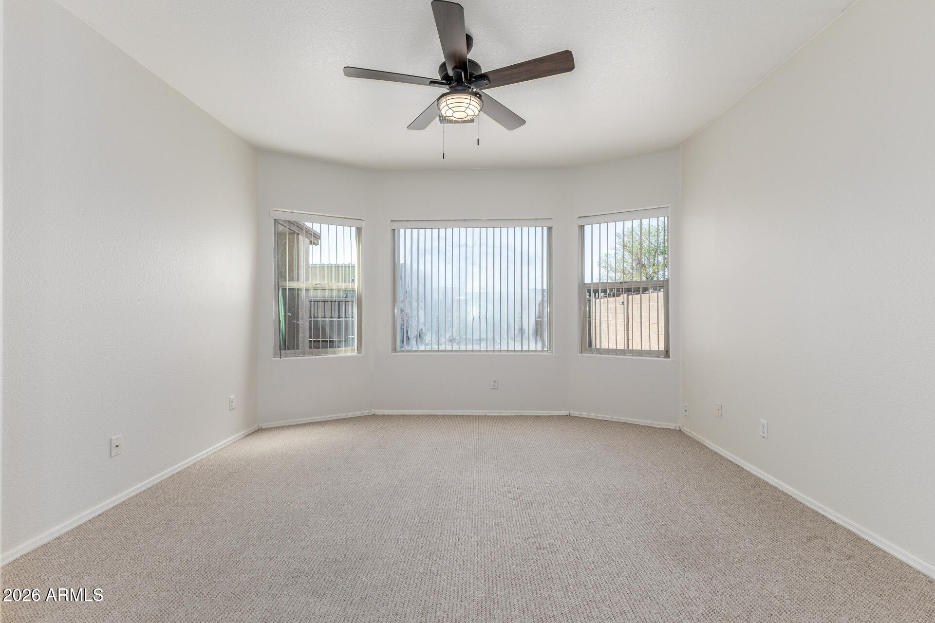 256 North 110th Street Apache Junction, AZ 85120 - Photo 12 of 27 a view of an empty room with a window
