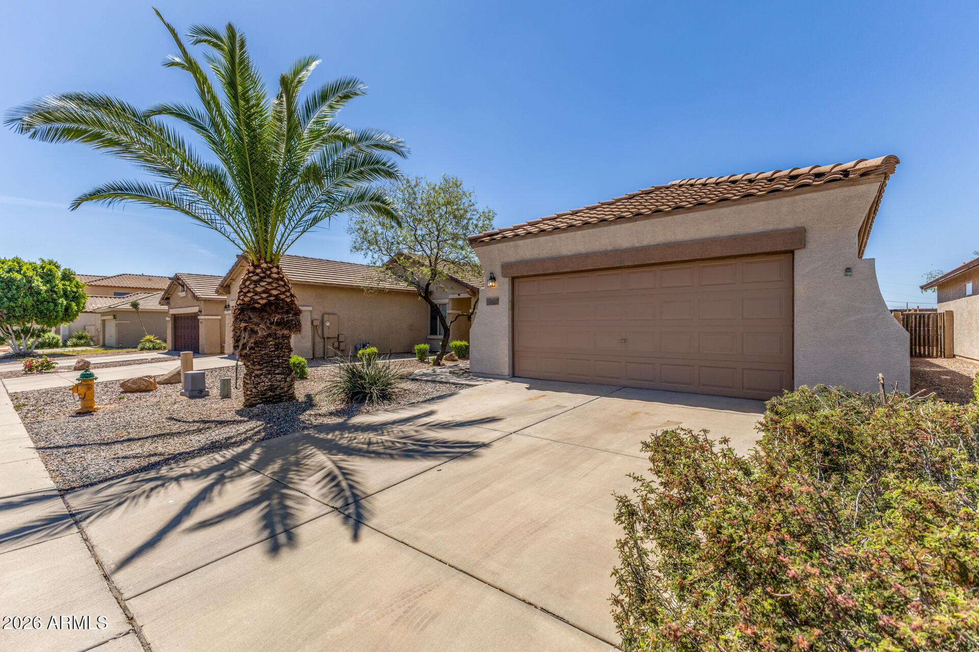 256 North 110th Street Apache Junction, AZ 85120 - Photo 2 of 27 a view of a house with backyard and sitting area