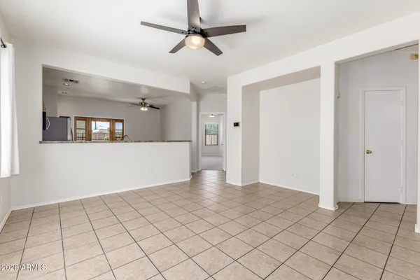 a view of an empty room and window