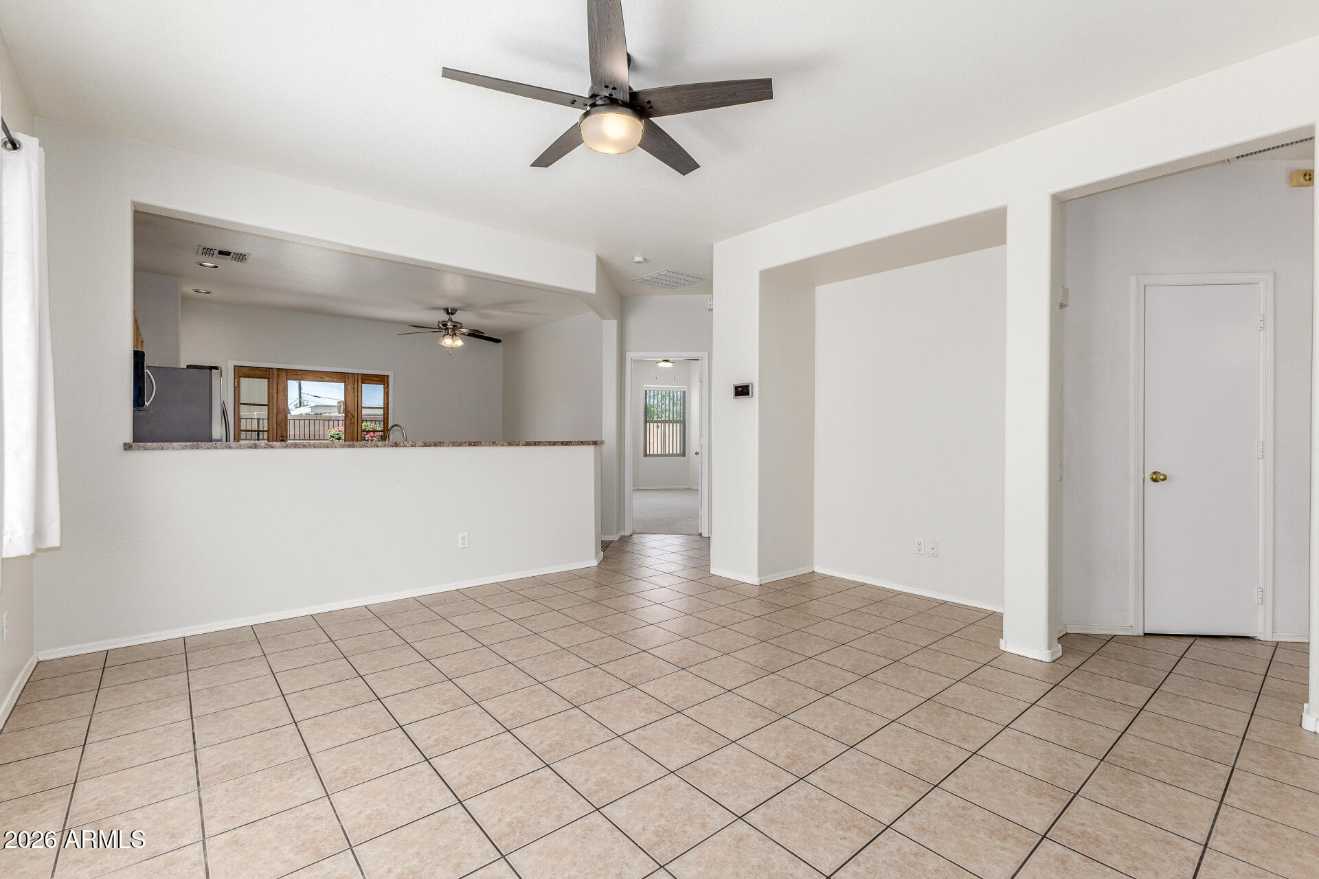 256 North 110th Street Apache Junction, AZ 85120 - Photo 4 of 27 a view of an empty room and window