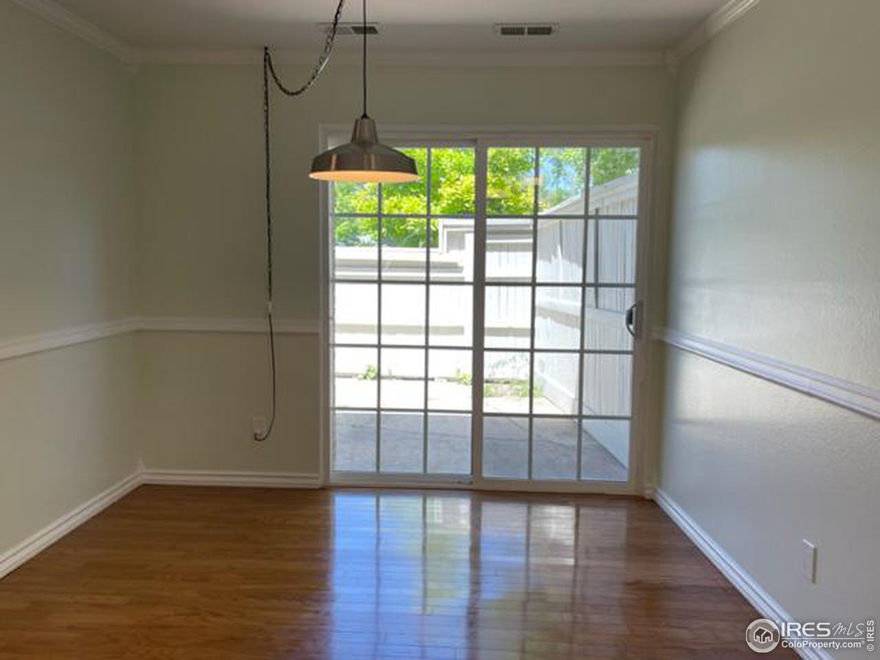 2661 Lloyd Circle Boulder, CO 80304 - Photo 11 of 28 a view of empty room with wooden floor and fan