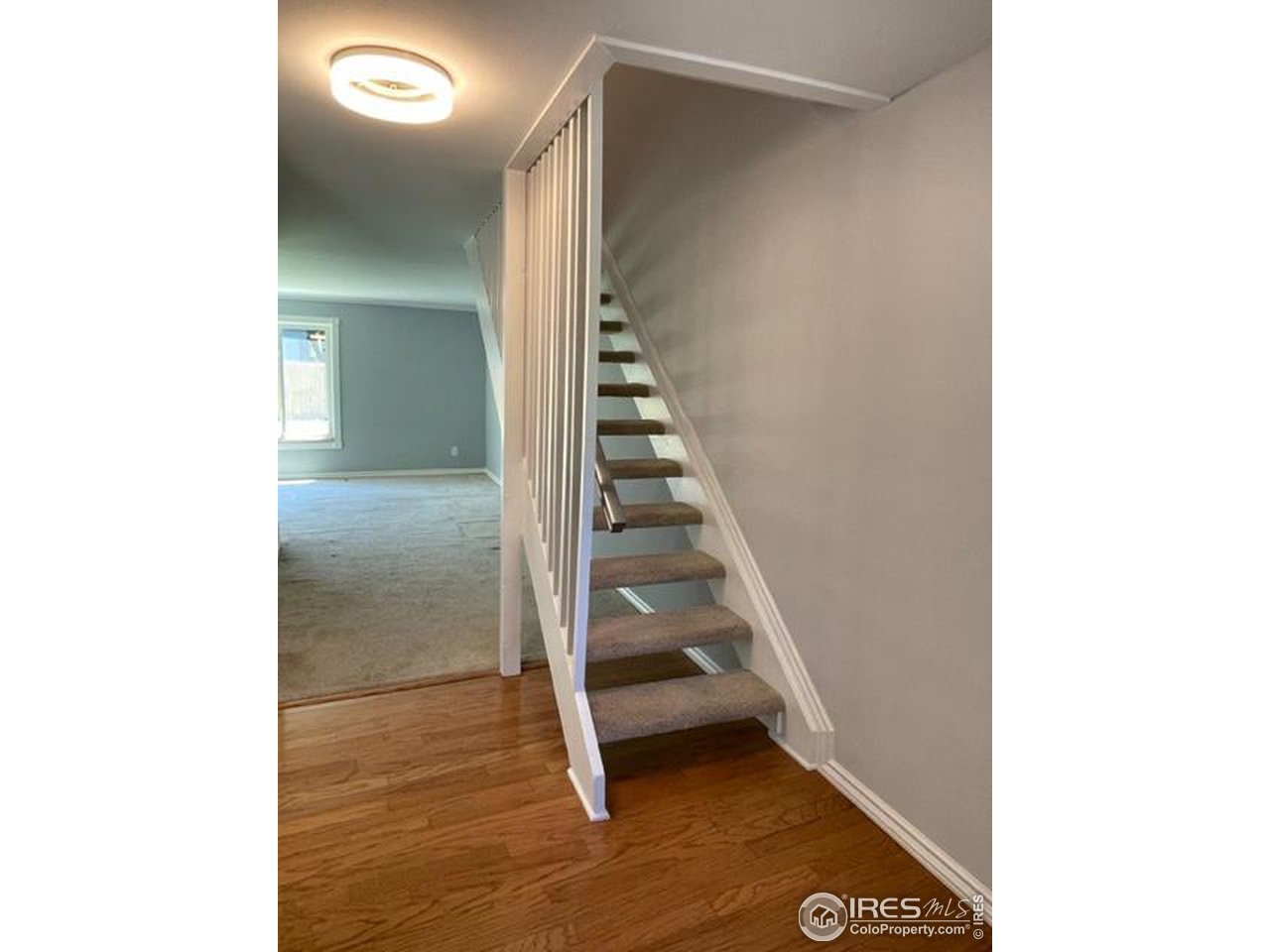2661 Lloyd Circle Boulder, CO 80304 - Photo 14 of 28 a view of a hallway with staircase
