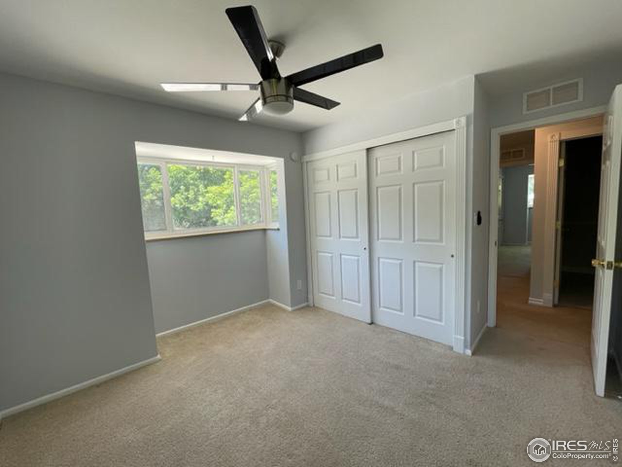 2661 Lloyd Circle Boulder, CO 80304 - Photo 16 of 28 an empty room with windows and closet