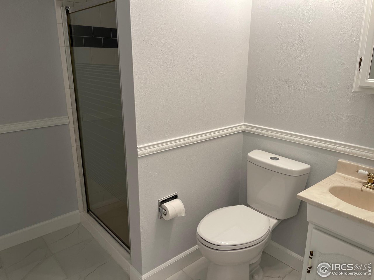 2661 Lloyd Circle Boulder, CO 80304 - Photo 17 of 28 a bathroom with a toilet and a sink