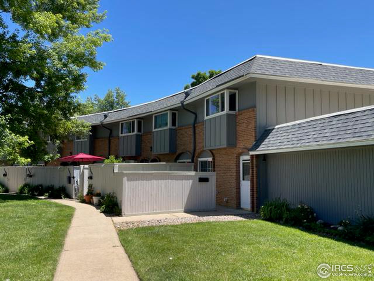2661 Lloyd Circle Boulder, CO 80304 - Photo 2 of 28 a front view of house with yard and outdoor seating