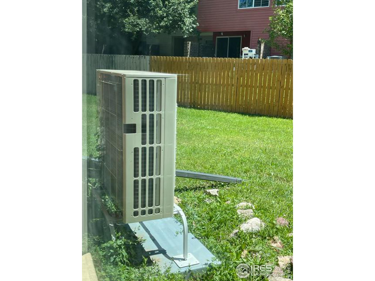 2661 Lloyd Circle Boulder, CO 80304 - Photo 27 of 28 a view of a house with a small yard and plants