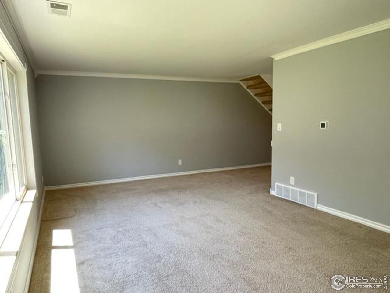 2661 Lloyd Circle Boulder, CO 80304 - Photo 4 of 28 an empty room with a window