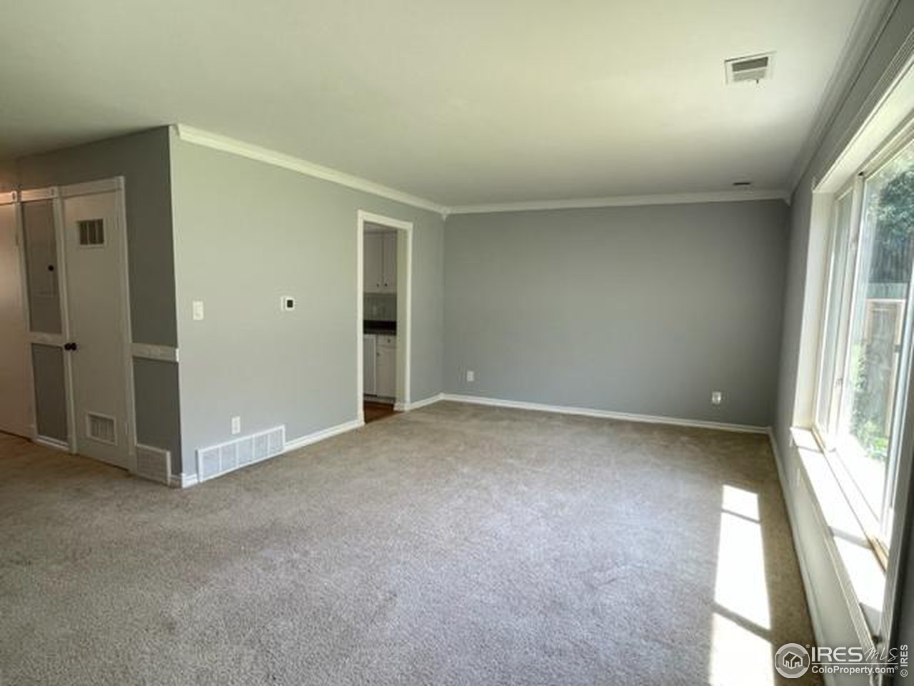 2661 Lloyd Circle Boulder, CO 80304 - Photo 6 of 28 an empty room with windows