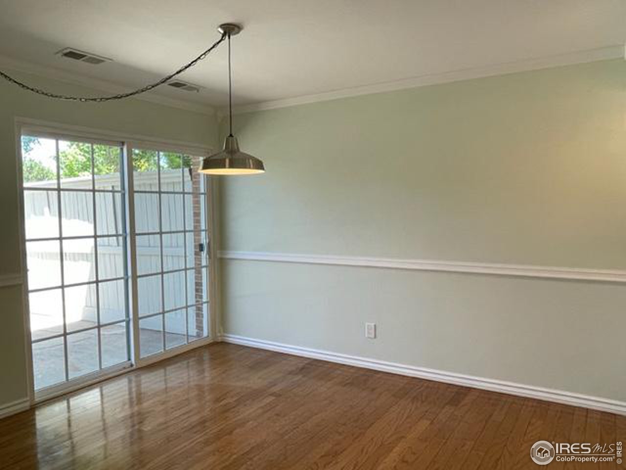 2661 Lloyd Circle Boulder, CO 80304 - Photo 10 of 28 a view of empty room with wooden floor and fan