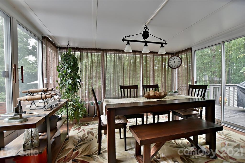 407 Laurel Hills Road Indian Land, SC 29707 - Photo 11 of 26 a view of a dining room with furniture window and outside view