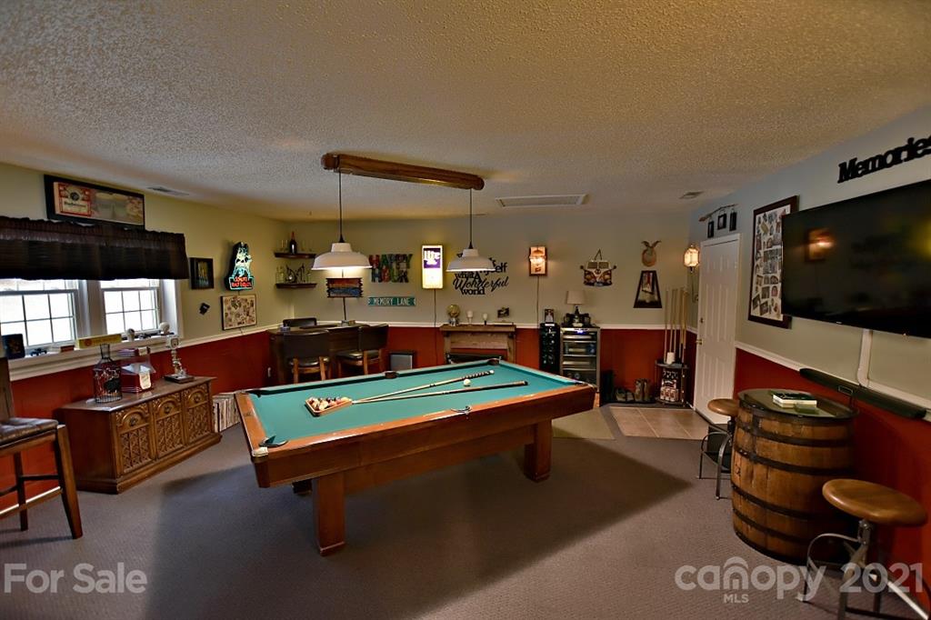407 Laurel Hills Road Indian Land, SC 29707 - Photo 12 of 26 a living room with furniture and a flat screen tv