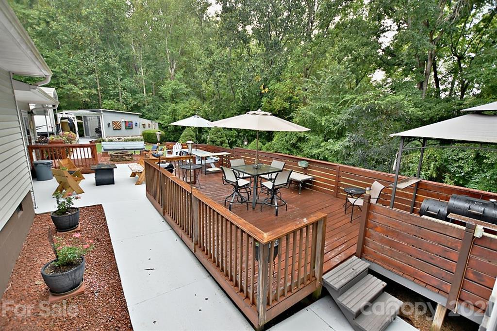 407 Laurel Hills Road Indian Land, SC 29707 - Photo 19 of 26 a view of a chairs and tables in the balcony