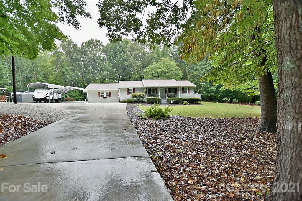 407 Laurel Hills Road Indian Land, SC 29707 - Photo 24 of 26 a view of a house with a yard