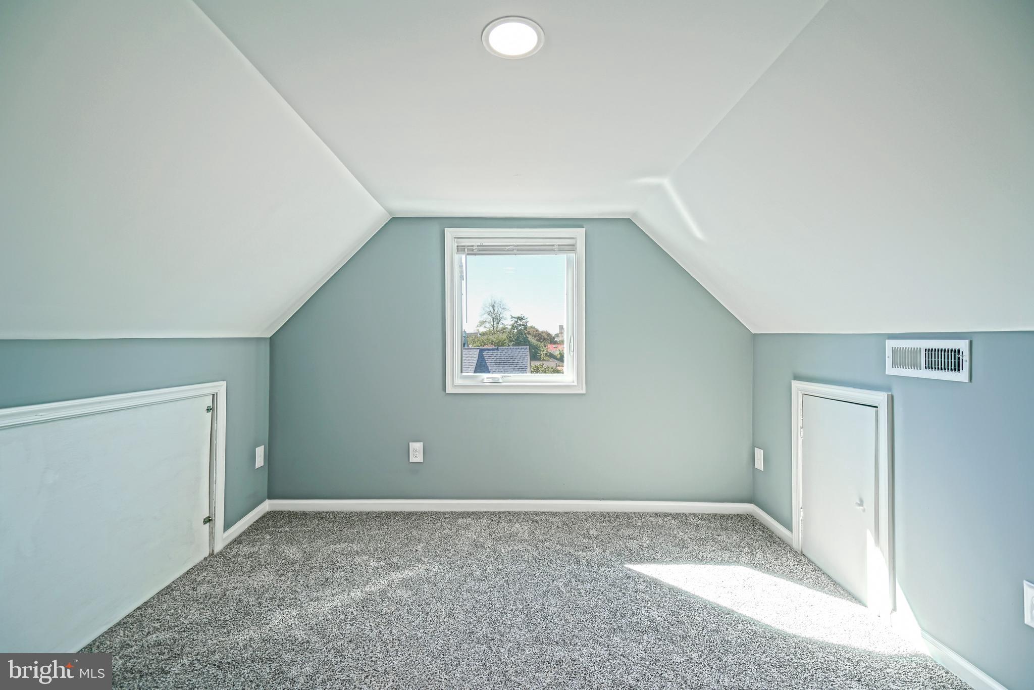110 West 3rd Street Lewes, DE 19958 - Photo 22 of 28 an empty room with windows and closet