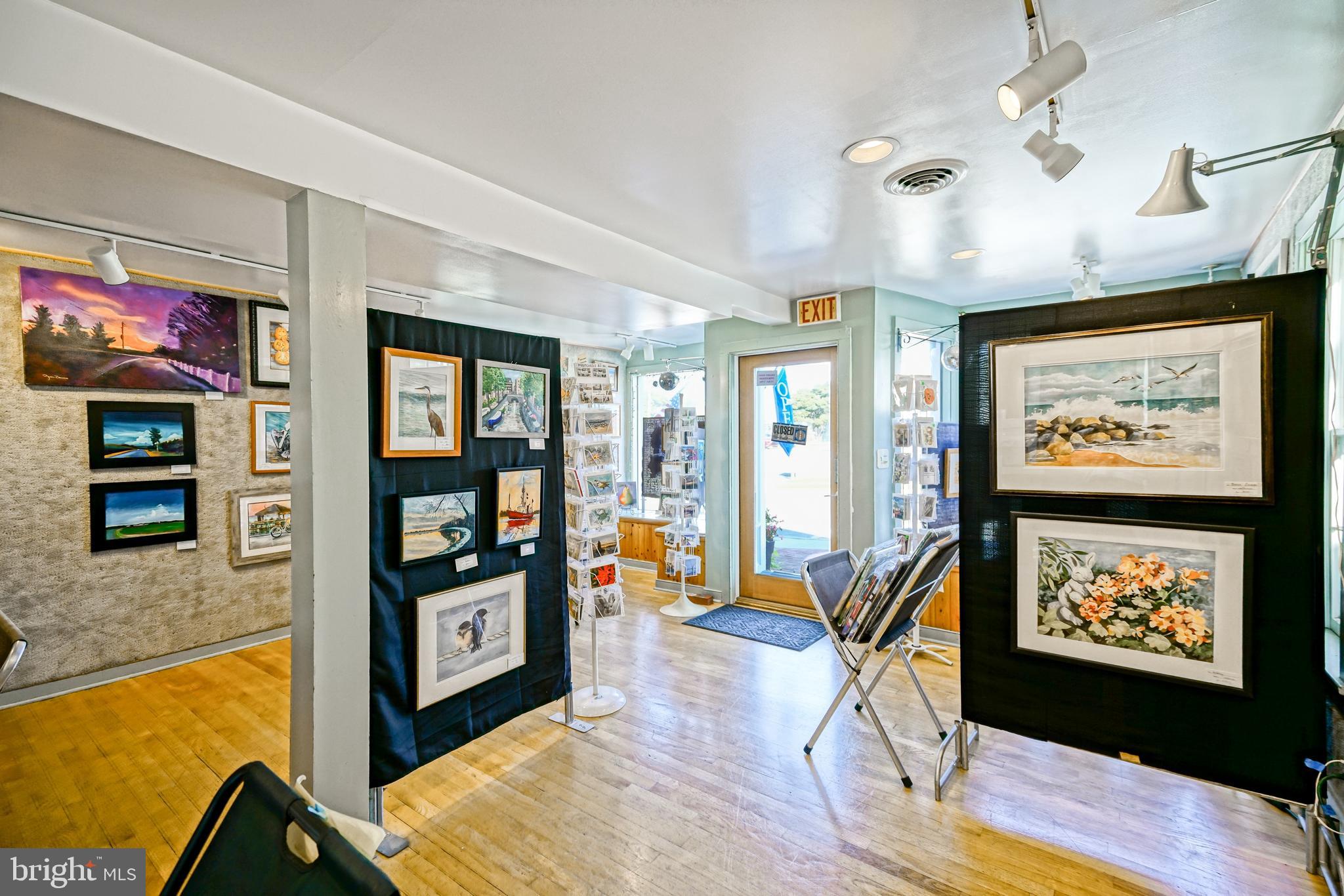 110 West 3rd Street Lewes, DE 19958 - Photo 4 of 28 a view of a livingroom with furniture wooden floor and windows