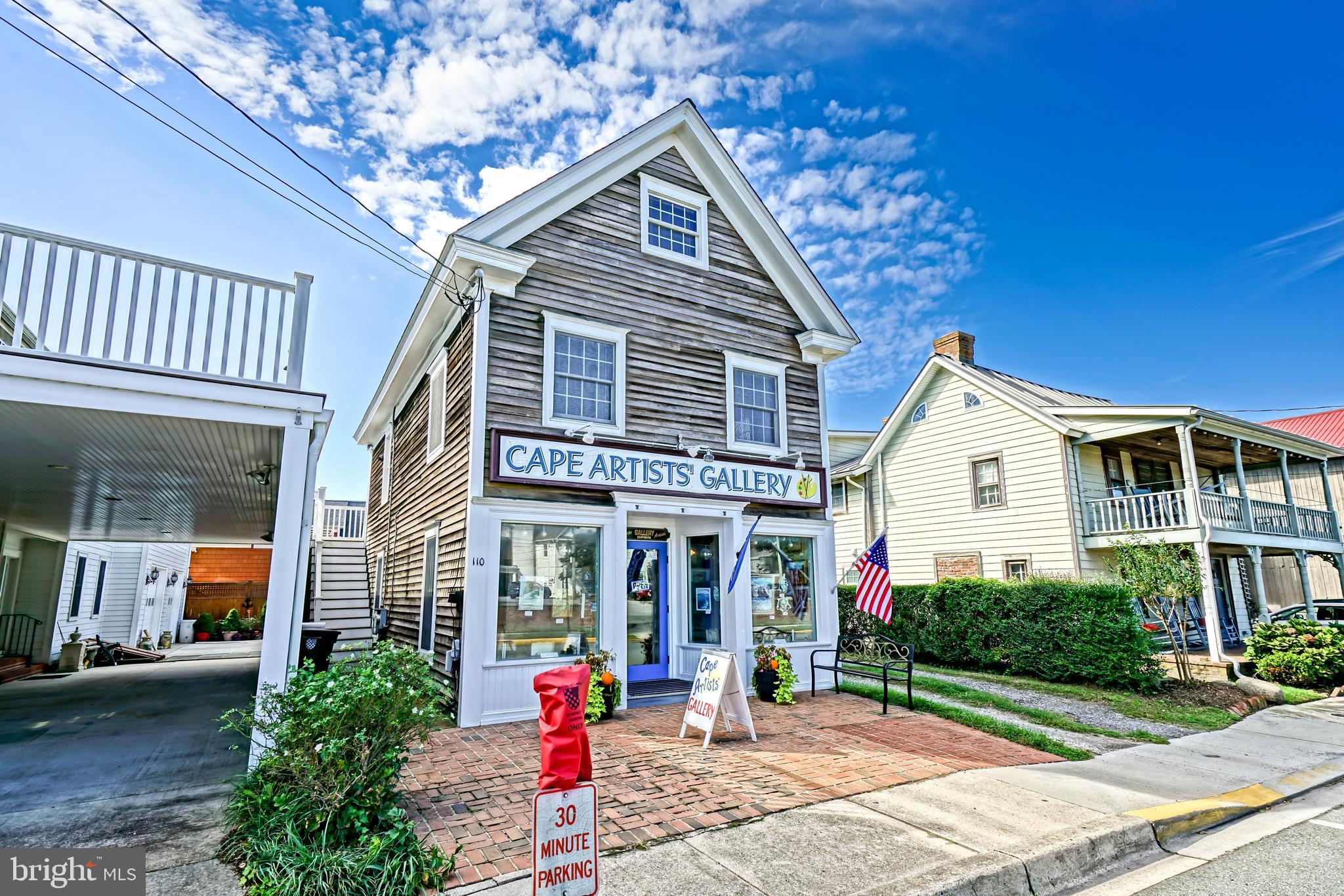 110 West 3rd Street Lewes, DE 19958 - Photo 7 of 28 a front view of a house with garden