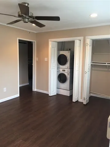 a view of a livingroom with wooden floor