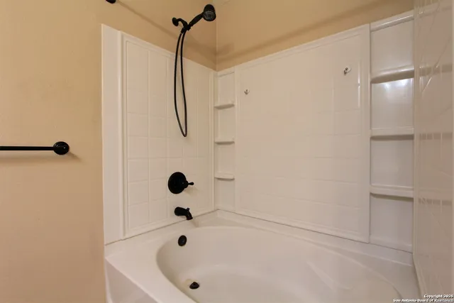 a bathroom with a bathtub