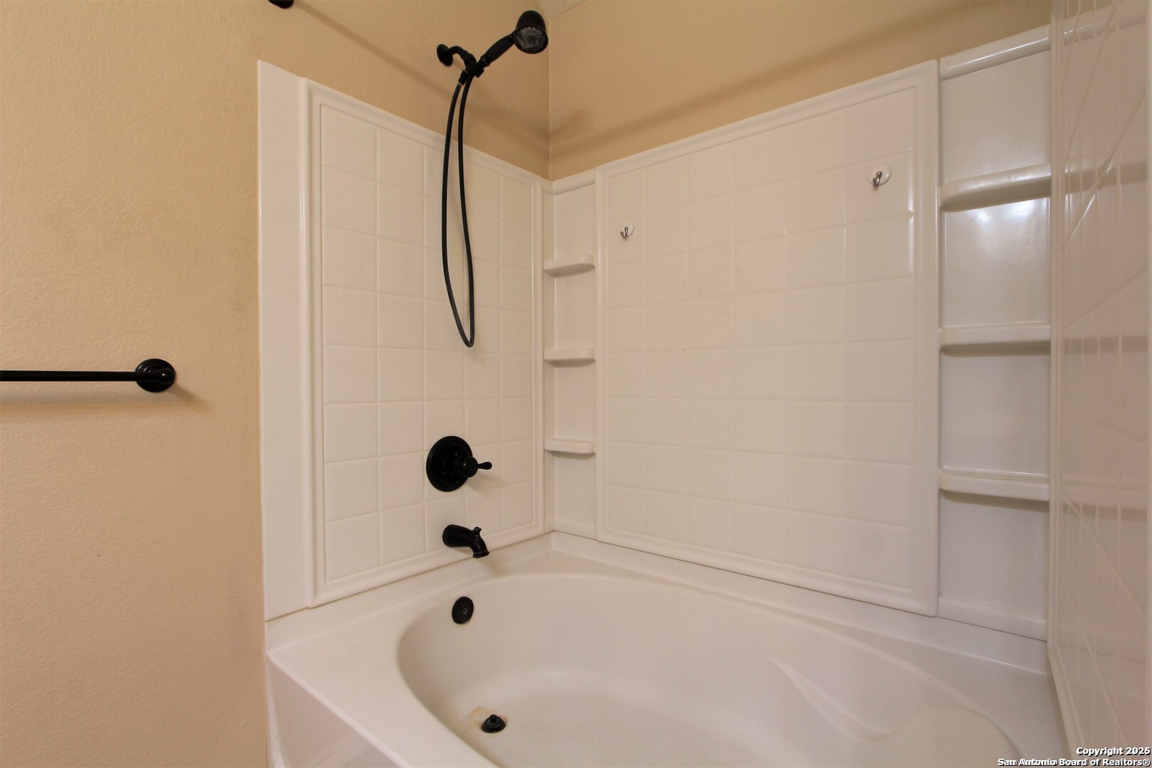 11118 Geneva Sound San Antonio, TX 78254 - Photo 12 of 15 a bathroom with a bathtub