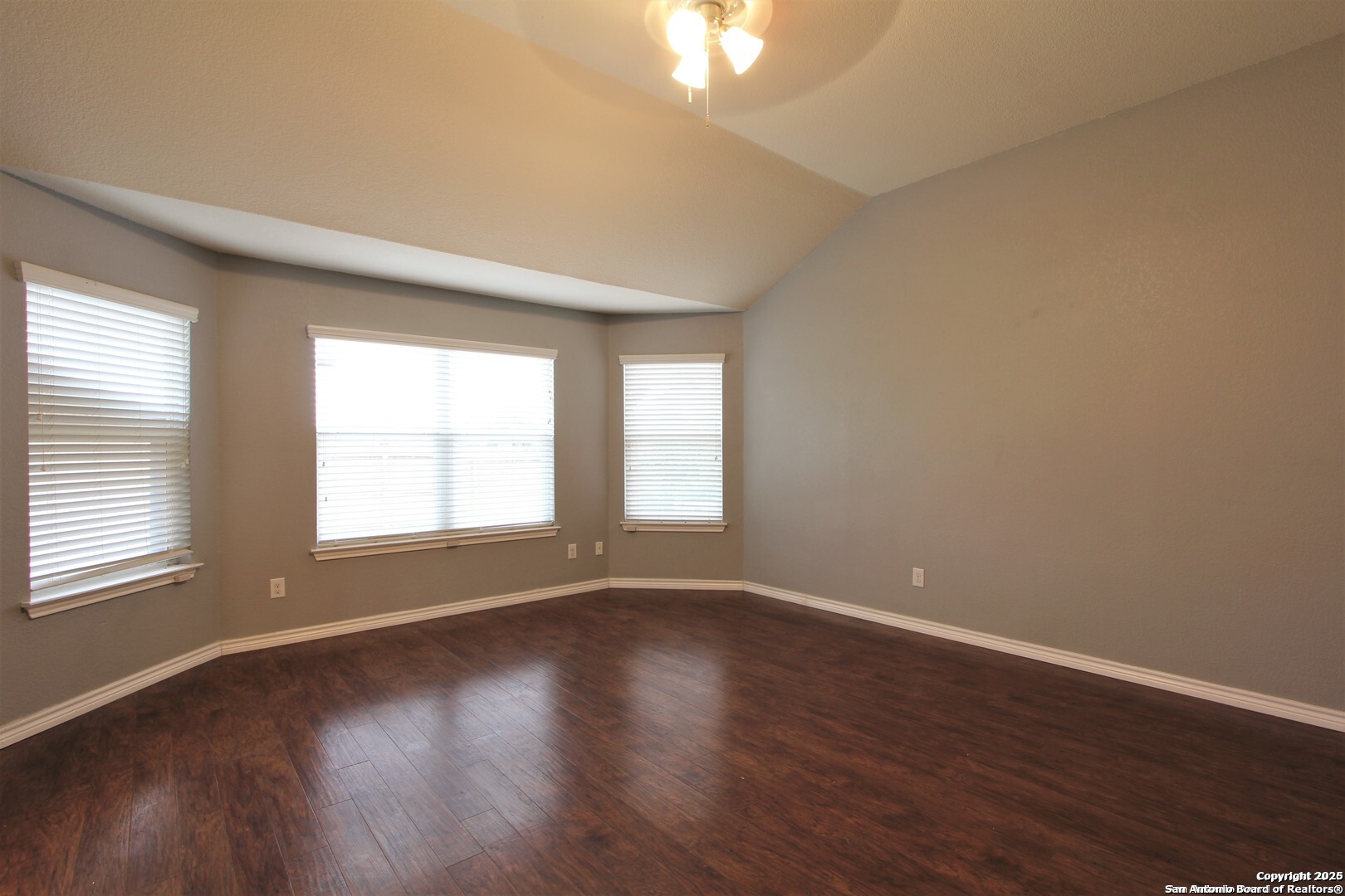 11118 Geneva Sound San Antonio, TX 78254 - Photo 14 of 15 wooden floor in an empty room with a window
