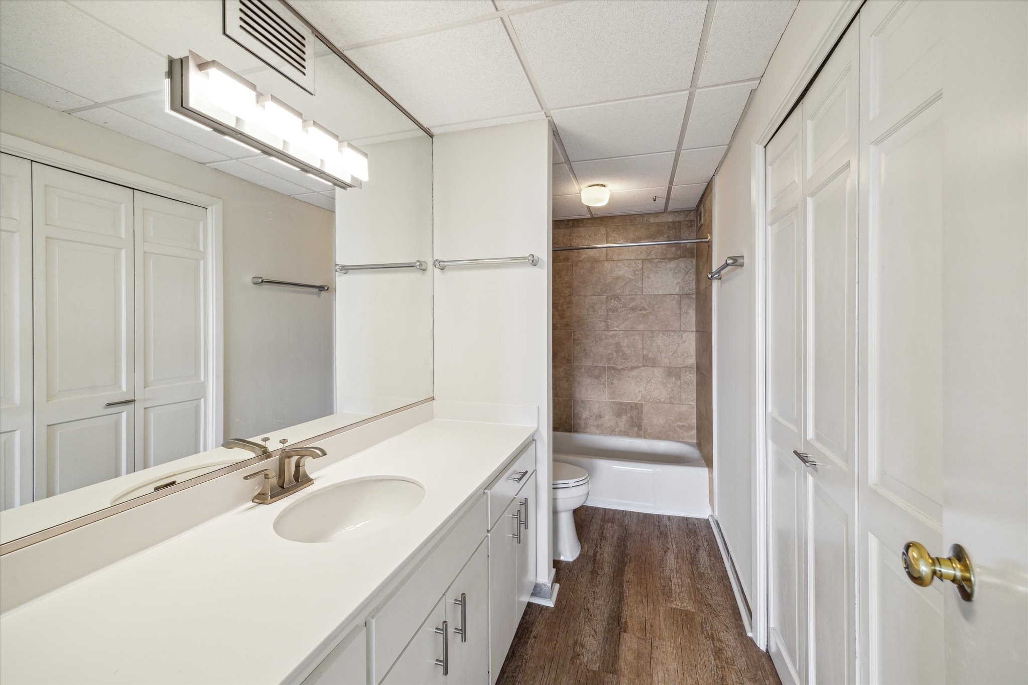 2929 Buffalo Speedway, Unit A306 Houston, TX 77098 - Photo 7 of 38 The en-suite bath has large vanity and extra storage.