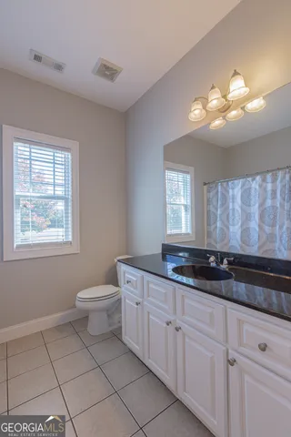 a room with furniture and a window