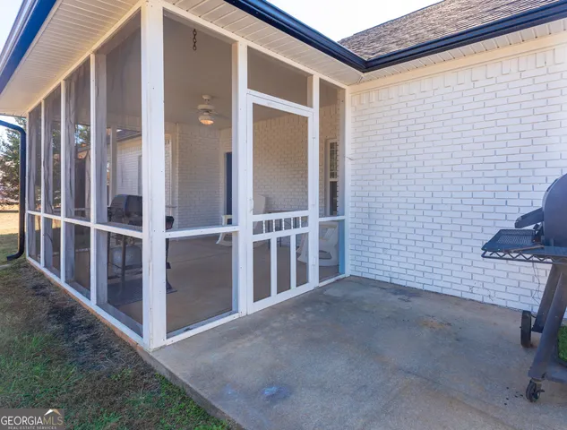 a house with a swimming pool in front of it