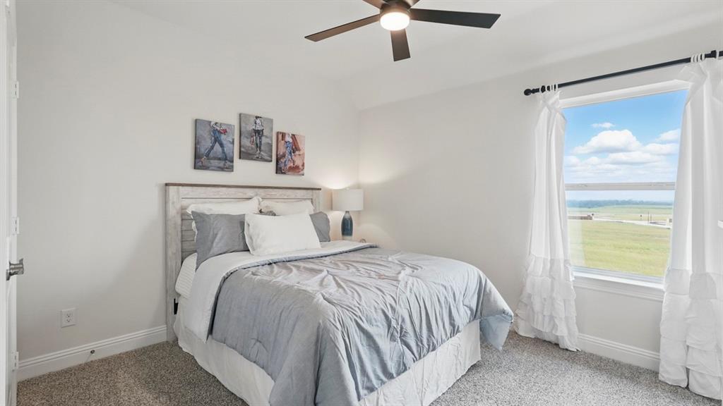 1016 Pitchfork Road Royse City, TX 75189 - Photo 26 of 35 a bedroom with a bed and a window