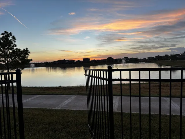 a view of a lake from a balcony