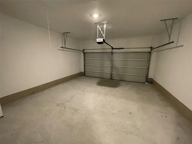 a view of a backyard with pathway