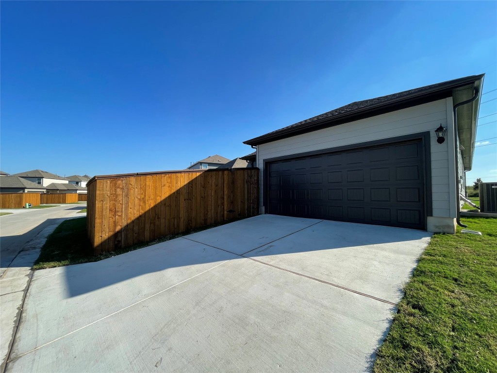101 Thurman Holt Road Hutto, TX 78634 - Photo 34 of 38 a view of front door and yard