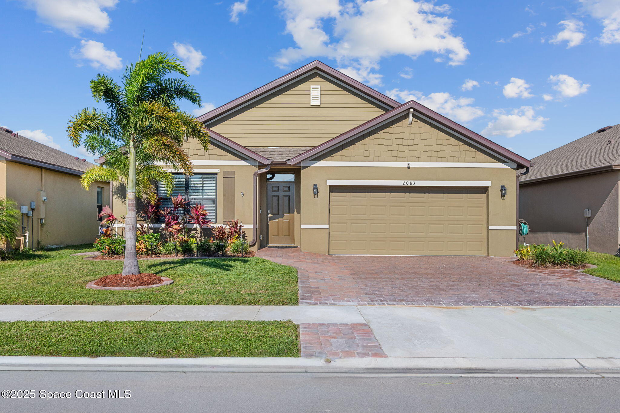 2083 Farmhouse Road Southeast Palm Bay, FL 32909 - Photo 1 of 41 2-web-or-mls-House-18
