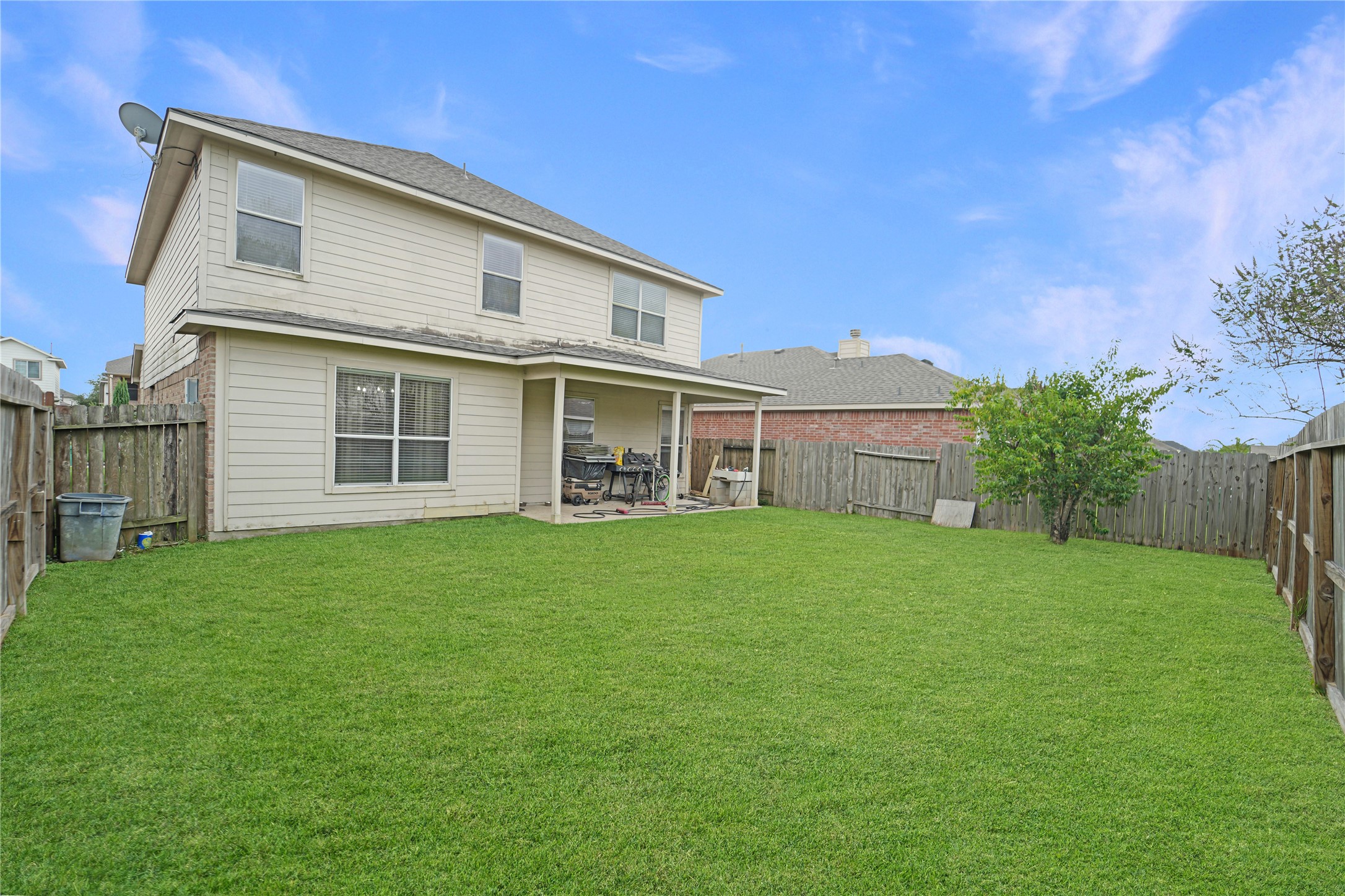15835 Flagstone Walk Way Houston, TX 77049 - Photo 8 of 8 a front view of a house with a garden