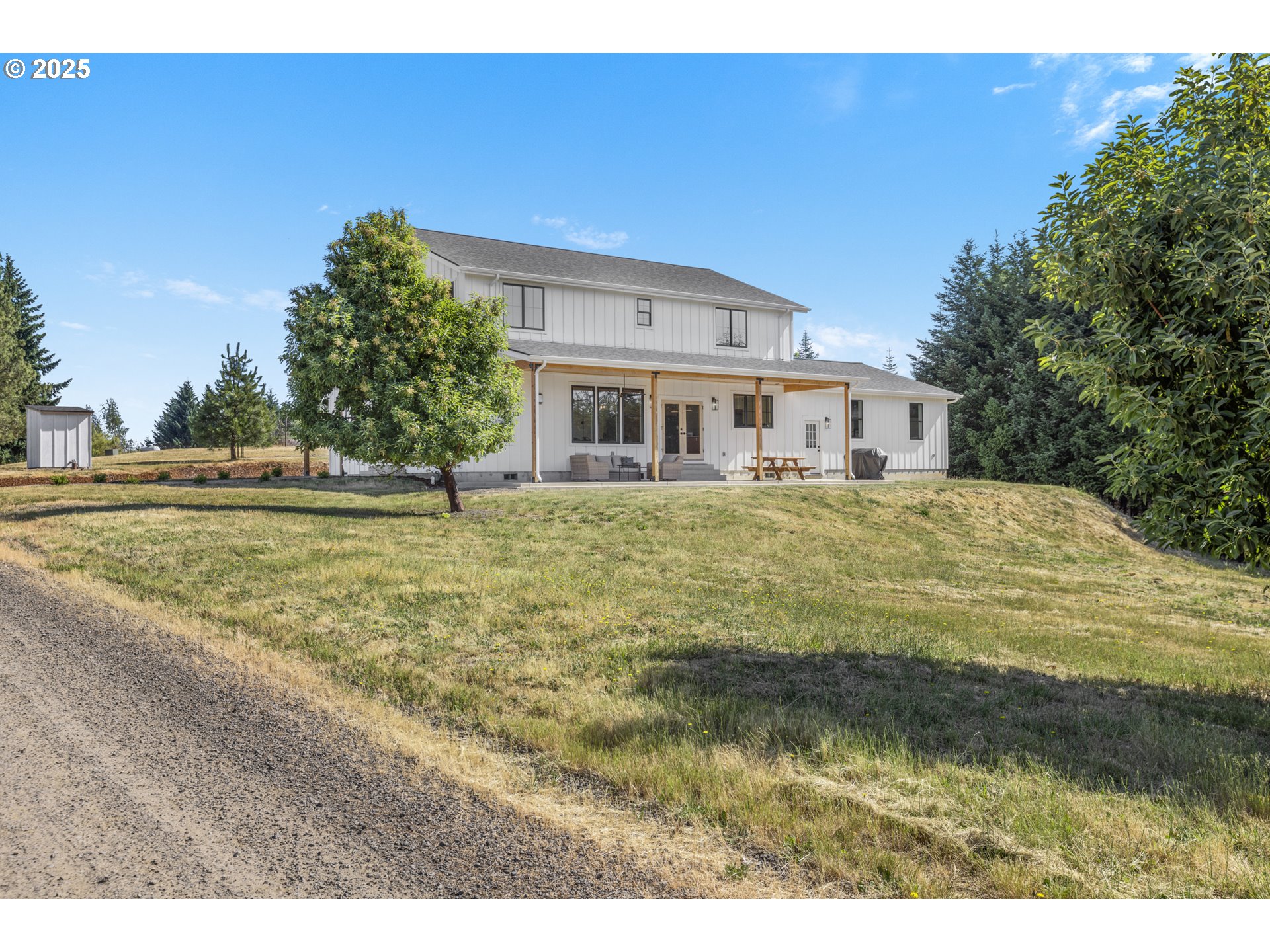 25053 Larson Road Monroe, OR 97456 - Photo 3 of 45 a view of a house with a yard