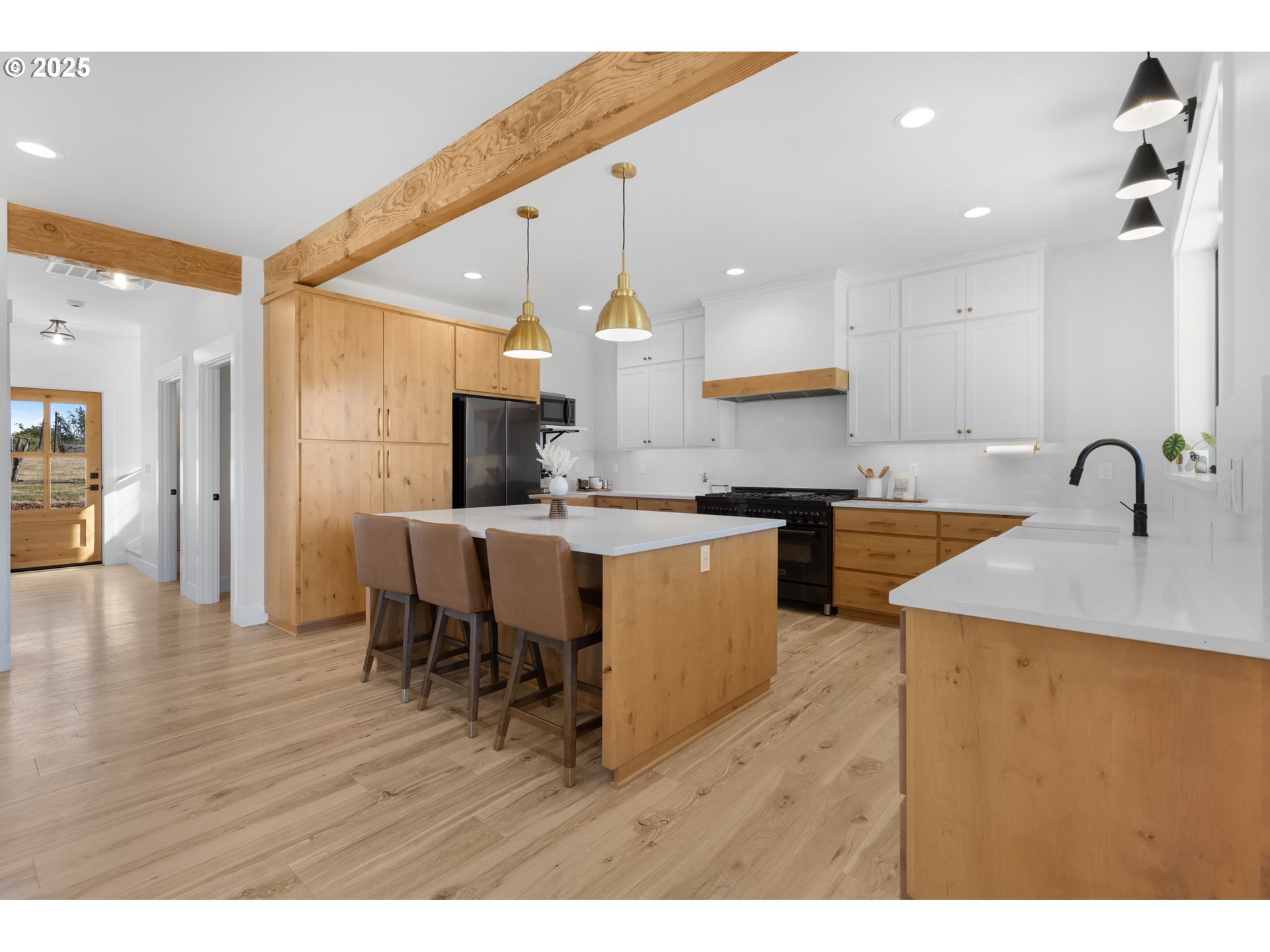 25053 Larson Road Monroe, OR 97456 - Photo 7 of 45 a kitchen with stainless steel appliances granite countertop a sink dishwasher a stove and a refrigerator with wooden floor
