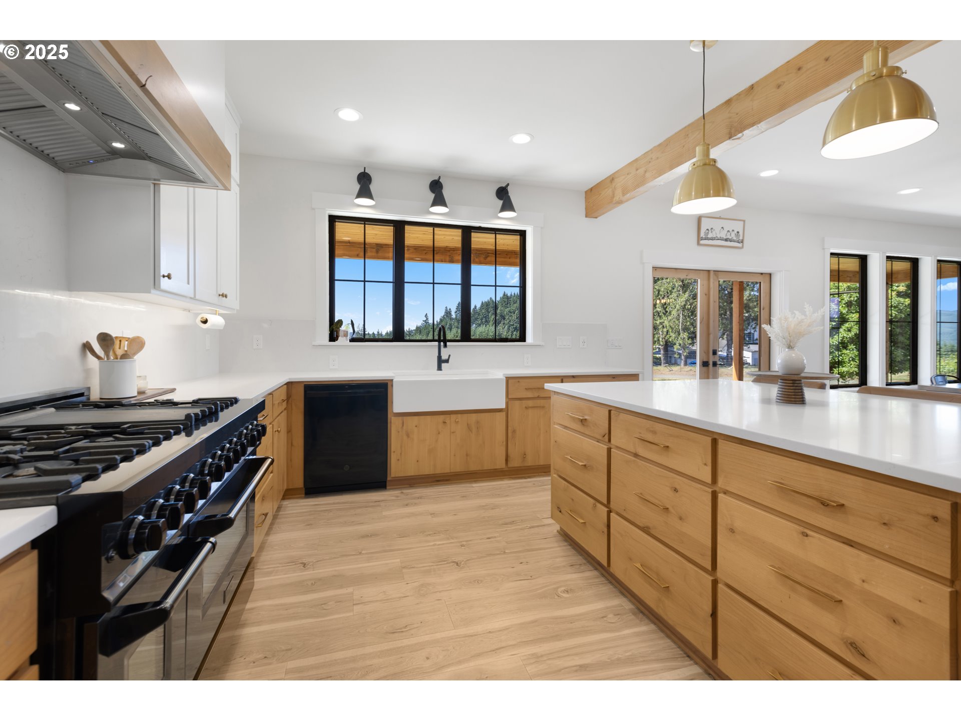 25053 Larson Road Monroe, OR 97456 - Photo 10 of 45 a large kitchen with stainless steel appliances granite countertop a stove a sink and a microwave