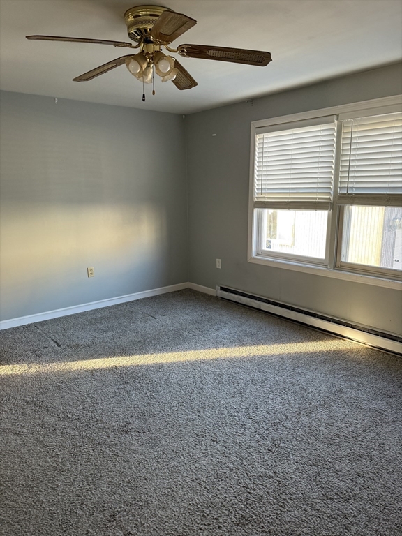 88 Almy Street, Unit 2C Fall River, MA 02720 - Photo 2 of 5 an empty room with a empty space and windows