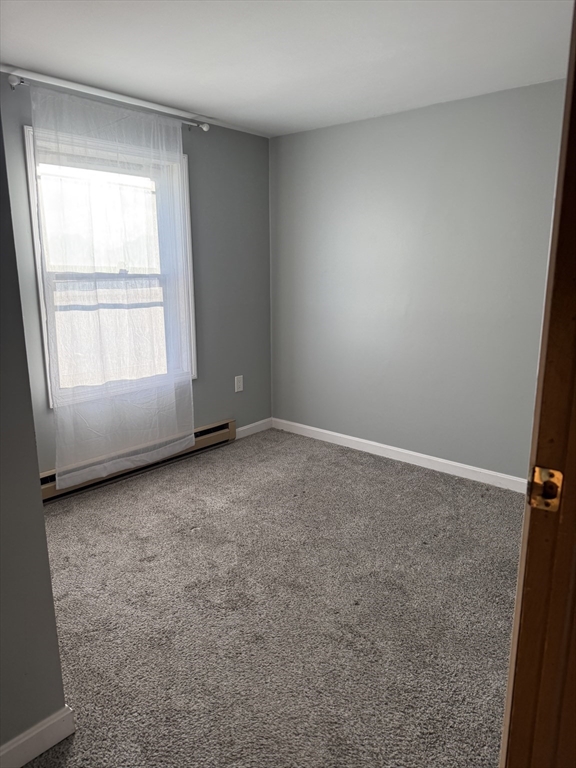 88 Almy Street, Unit 2C Fall River, MA 02720 - Photo 5 of 5 an empty room with a window