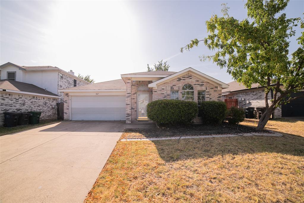 8167 Waterside Trail Fort Worth, TX 76137 - Photo 1 of 1 a view of a street with a house in the background