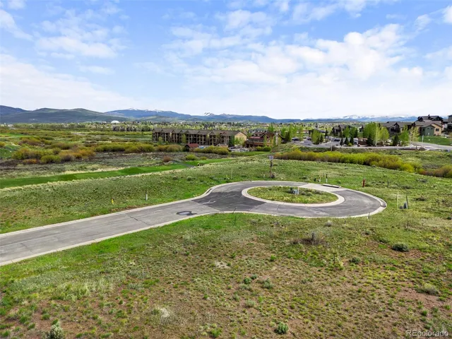 a view of a swimming pool with an outdoor seating