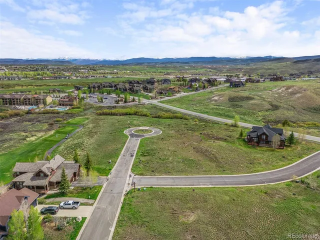 a view of a lake with a yard