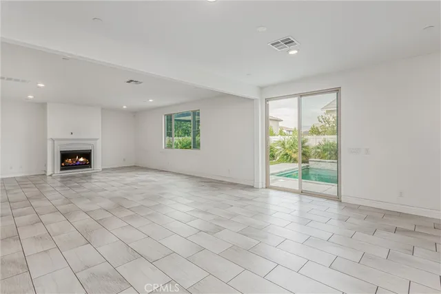 a view of livingroom with furniture and fireplace