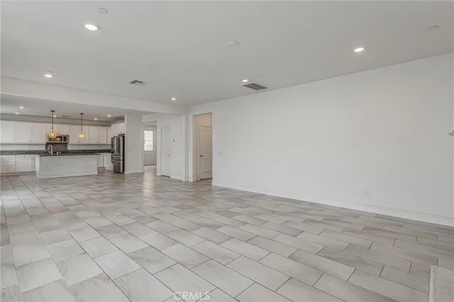 a view of a kitchen with a sink