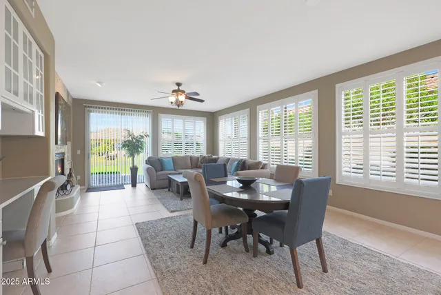 a bedroom with furniture and windows