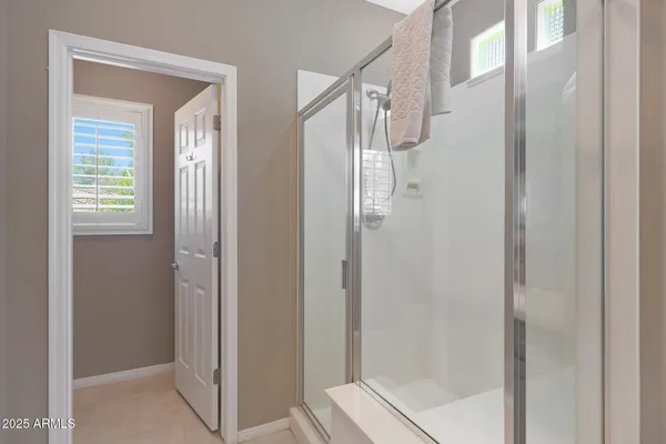 a room with a walk in closet and a window