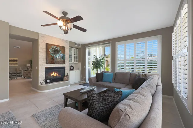 a kitchen with stainless steel appliances granite countertop a sink and a refrigerator