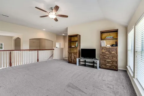 a view of a livingroom with a flat screen tv