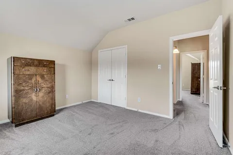 an empty room with closet