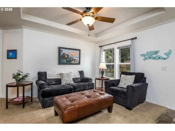 a living room with furniture and a window